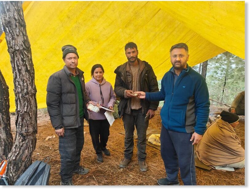 The authorities give compensation to a shepherd in the Solan area on Sunday.