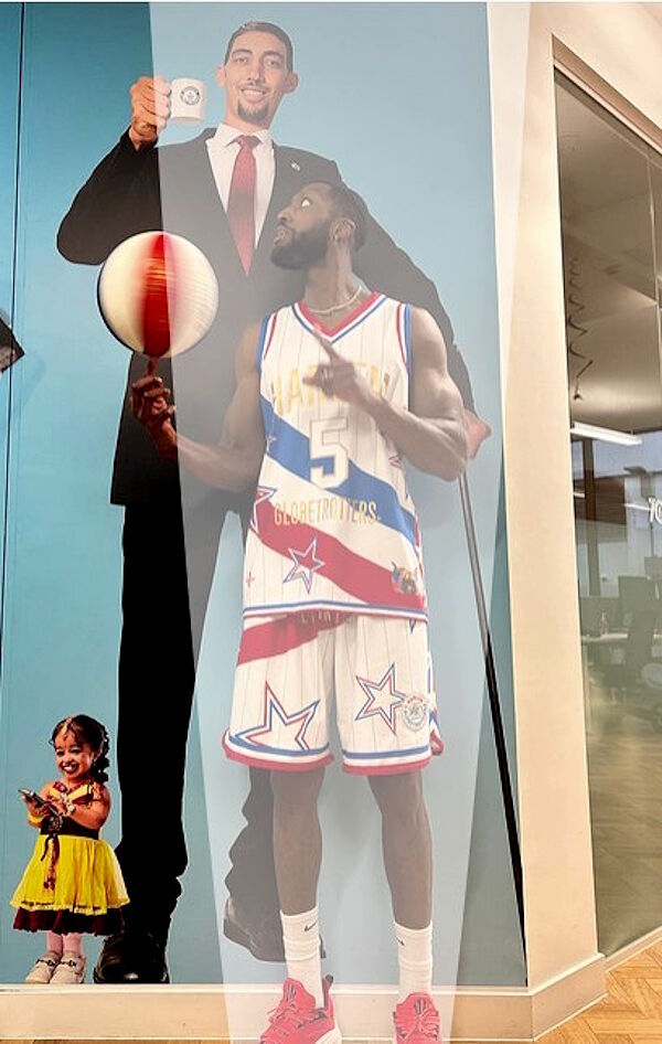 Bulldog Mack in GWR's London office, standing with our to-scale portrait of Sultan Kösen.
