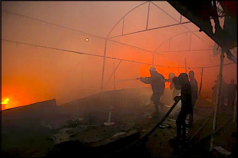 people battle fire
