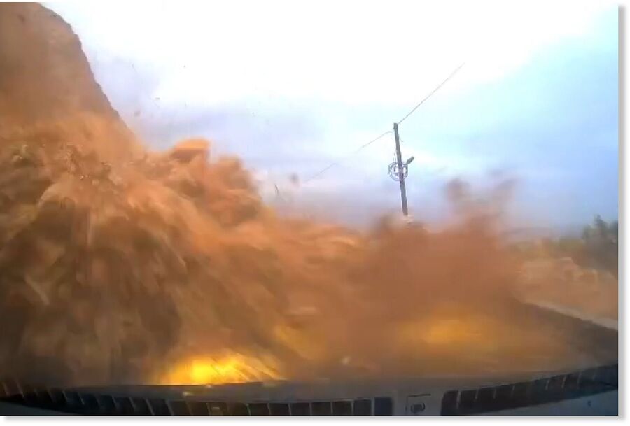 sudden landslide buries car ..