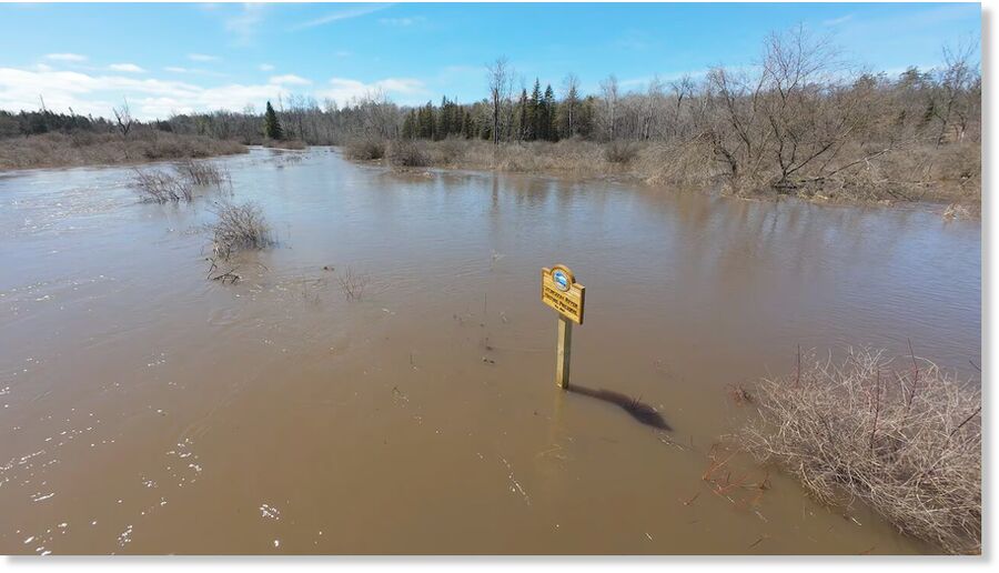 A drone shot shows the flooding along the Sturgeon River in Cheboygan County on April 14,