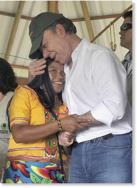 Juan Manuel Santos abrazo
